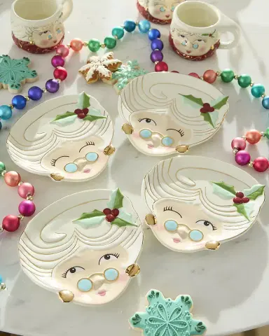 Glitterville Mrs. Papa Noel Ceramic Christmas Plates, Set of 4 | Thumbnail 1 Glitterville Mrs. Papa Noel Ceramic Christmas Plates, Set of 4 | Thumbnail 1