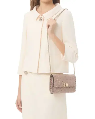 Valentino Garavani Quilted Rockstud Leather Crossbody Bag | Thumbnail 1 Valentino Garavani Quilted Rockstud Leather Crossbody Bag | Thumbnail 1
