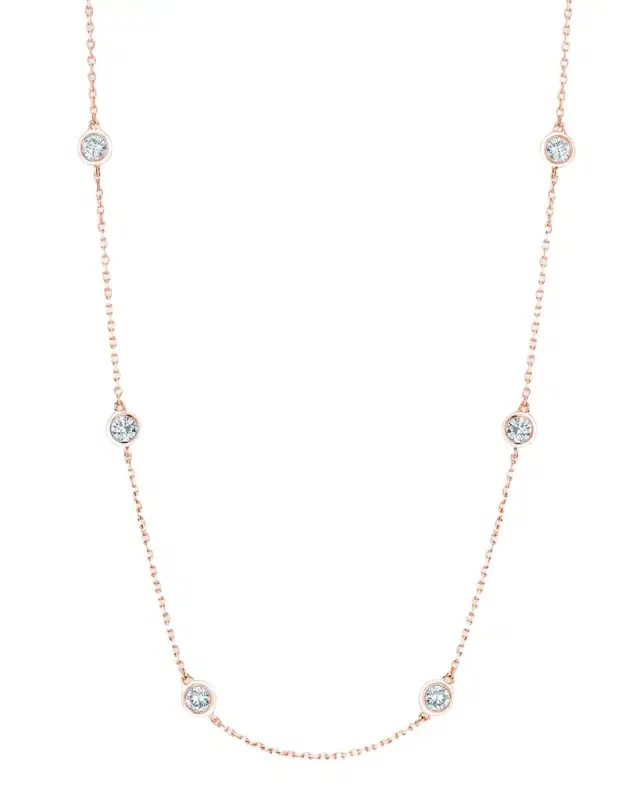 18K Gold Diamond by the Yard Chain Necklace with 1.5" Spacing Between Bezels 18K Gold Diamond by the Yard Chain Necklace with 1.5" Spacing Between Bezels