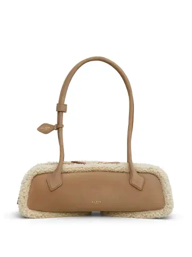 Alaïa Merino Shearling Medium Le Teckel Bag | Thumbnail 1 Alaïa Merino Shearling Medium Le Teckel Bag | Thumbnail 1
