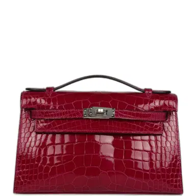 HERMÈS Hermes Kelly Pochette Rose Pourpre Shiny Alligator Mississippiensis Palladium Hardware | Thumbnail 1 HERMÈS Hermes Kelly Pochette Rose Pourpre Shiny Alligator Mississippiensis Palladium Hardware | Thumbnail 1