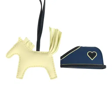 HERMÈS Hermes Rodeo Robeo Coeur Charm PM Jaune Milton, Bleu Nuit and Bleu Tie Milo Lambskin | Thumbnail 3 HERMÈS Hermes Rodeo Robeo Coeur Charm PM Jaune Milton, Bleu Nuit and Bleu Tie Milo Lambskin | Thumbnail 3