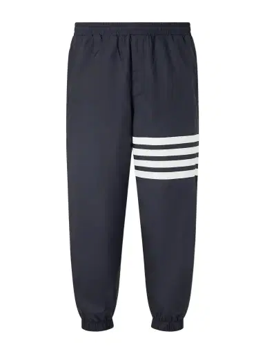 Thom Browne Tapered Striped Ripstop Sweatpants - Men | Thumbnail 1 Thom Browne Tapered Striped Ripstop Sweatpants - Men | Thumbnail 1