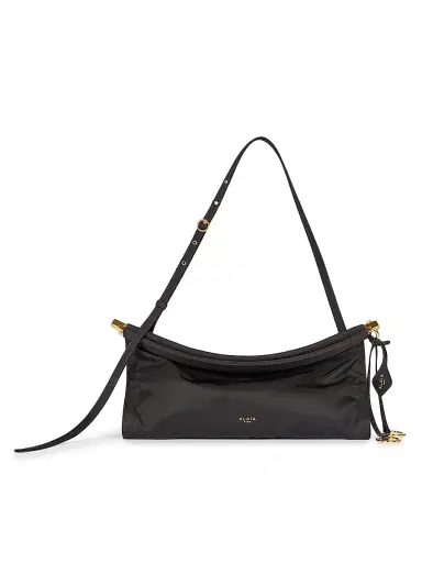 Alaïa Women's Le Clik East West Padded Nylon Shoulder Bag - Noir | Thumbnail 1 Alaïa Women's Le Clik East West Padded Nylon Shoulder Bag - Noir | Thumbnail 1