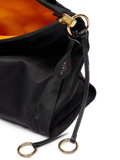 Alaïa Women's Le Clik East West Padded Nylon Shoulder Bag - Noir | Thumbnail 7 Alaïa Women's Le Clik East West Padded Nylon Shoulder Bag - Noir | Thumbnail 7