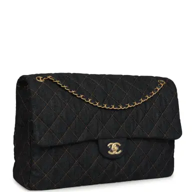 Chanel Chanel XXL Classic Single Travel Flap Bag Dark Blue Denim Brushed Gold Hardware | Thumbnail 2 Chanel Chanel XXL Classic Single Travel Flap Bag Dark Blue Denim Brushed Gold Hardware | Thumbnail 2