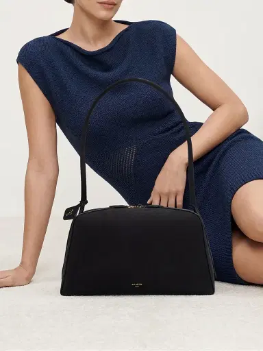 Alaïa Women's Le Bouledogue Nubuck Shoulder Bag - Noir | Thumbnail 2 Alaïa Women's Le Bouledogue Nubuck Shoulder Bag - Noir | Thumbnail 2
