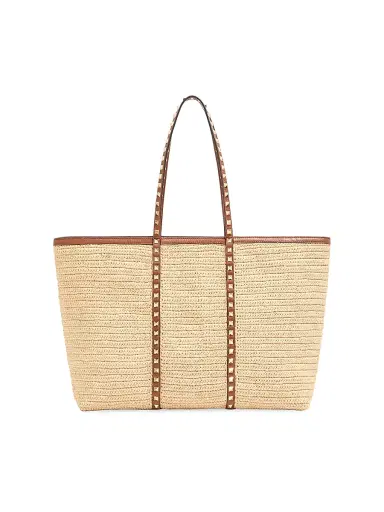 Valentino Garavani Women's Rockstud Shopping Bag in Raffia - Natural | Thumbnail 1 Valentino Garavani Women's Rockstud Shopping Bag in Raffia - Natural | Thumbnail 1