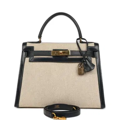 HERMÈS Vintage Hermes Kelly Sellier 28 Bleu Marine Box and Beige-Ecru Toile H Canvas Gold Hardware | Thumbnail 1 HERMÈS Vintage Hermes Kelly Sellier 28 Bleu Marine Box and Beige-Ecru Toile H Canvas Gold Hardware | Thumbnail 1