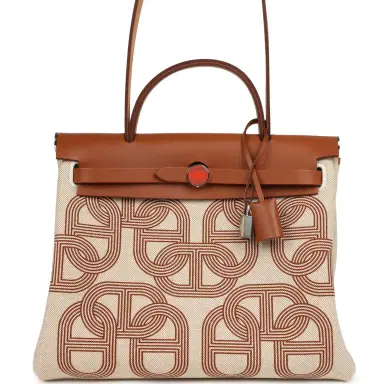HERMÈS Hermes Special Order (HSS) Herbag Zip PM 31 "Circuit 24" Fauve and Ecru Toile H Canvas and Fauve Hunter Lacquered Palladium Hardware | Thumbnail 1 HERMÈS Hermes Special Order (HSS) Herbag Zip PM 31 "Circuit 24" Fauve and Ecru Toile H Canvas and Fauve Hunter Lacquered Palladium Hardware | Thumbnail 1