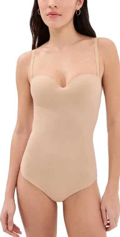 Wolford Forming String Thong Bodysuit Powder | Thumbnail 1 Wolford Forming String Thong Bodysuit Powder | Thumbnail 1