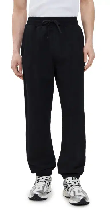 REIGNING CHAMP Mid-Weight Terry Cuffed Relaxed Sweatpants Black | Thumbnail 1 REIGNING CHAMP Mid-Weight Terry Cuffed Relaxed Sweatpants Black | Thumbnail 1