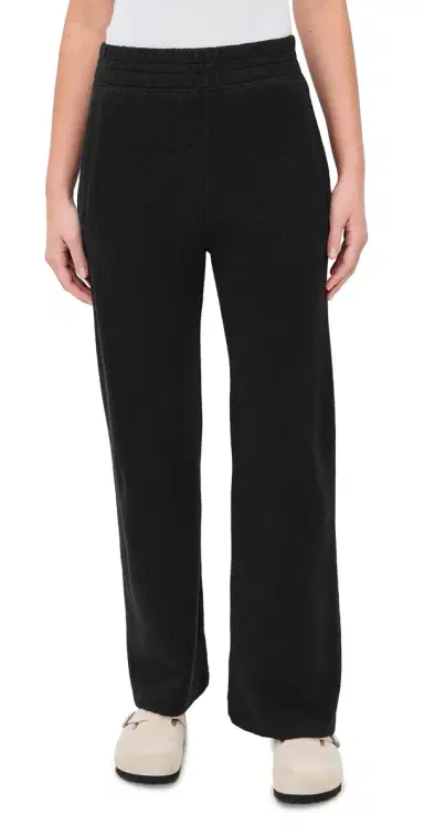 THE GREAT. The Plush Victory Sweatpants Almost Black | Thumbnail 1 THE GREAT. The Plush Victory Sweatpants Almost Black | Thumbnail 1