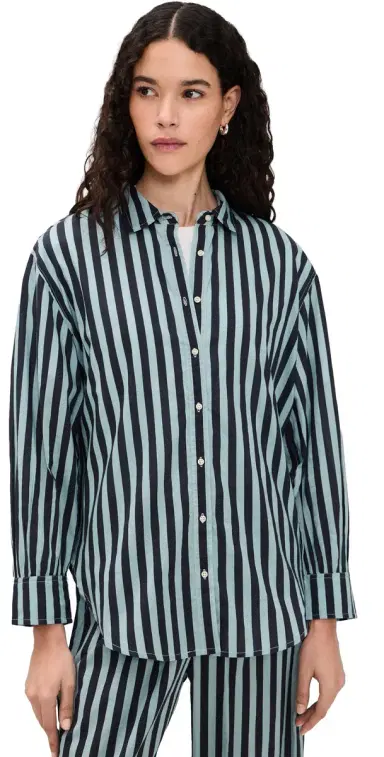 The Great. THE GREAT. The Daily Button Up Blue Club Stripe 2 | Thumbnail 1 The Great. THE GREAT. The Daily Button Up Blue Club Stripe 2 | Thumbnail 1