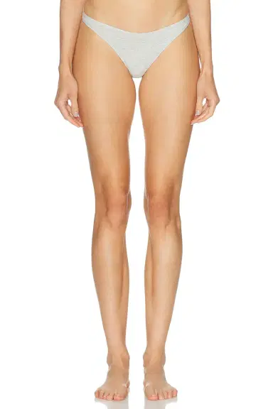 Skims Everyday Cotton Thong | Thumbnail 1 Skims Everyday Cotton Thong | Thumbnail 1