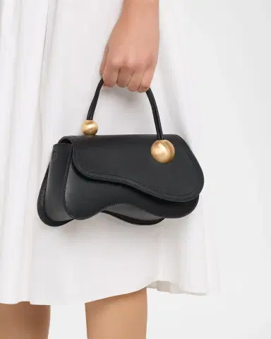 Cult Gaia Kazia Sculptural Leather Top-Handle Bag | Thumbnail 1 Cult Gaia Kazia Sculptural Leather Top-Handle Bag | Thumbnail 1