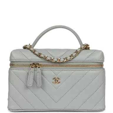 Chanel Chanel Chevron Top Handle Long Vanity Case with Chain Grey Shiny Caviar Gold Hardware | Thumbnail 1 Chanel Chanel Chevron Top Handle Long Vanity Case with Chain Grey Shiny Caviar Gold Hardware | Thumbnail 1