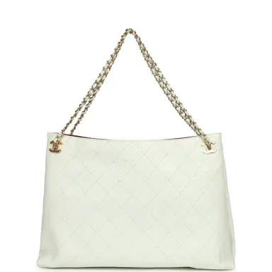 Chanel Chanel Large "Eyes on You" CC Shopping Bag Light Blue Lambskin Gold Hardware | Thumbnail 1 Chanel Chanel Large "Eyes on You" CC Shopping Bag Light Blue Lambskin Gold Hardware | Thumbnail 1