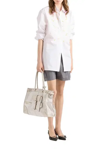 Prada Women's Bonnie Printed Linen and Leather Tote Bag - White | Thumbnail 1 Prada Women's Bonnie Printed Linen and Leather Tote Bag - White | Thumbnail 1
