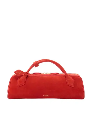 Alaïa ALAΪA Teckel Clutch Bag | Thumbnail 1 Alaïa ALAΪA Teckel Clutch Bag | Thumbnail 1