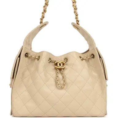 Chanel Pre-owned Chanel Small 25 Hobo Bag Beige Caviar Antique Gold Hardware | Thumbnail 1 Chanel Pre-owned Chanel Small 25 Hobo Bag Beige Caviar Antique Gold Hardware | Thumbnail 1