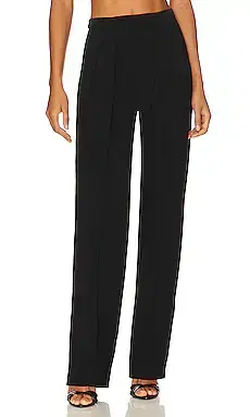 Norma Kamali Tapered Pleated Trouser | Thumbnail 1 Norma Kamali Tapered Pleated Trouser | Thumbnail 1