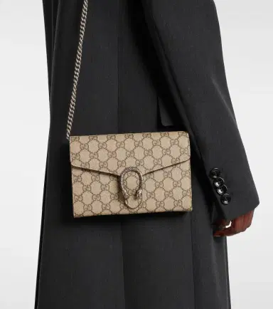Gucci Dionysus GG Supreme clutch | Thumbnail 5 Gucci Dionysus GG Supreme clutch | Thumbnail 5