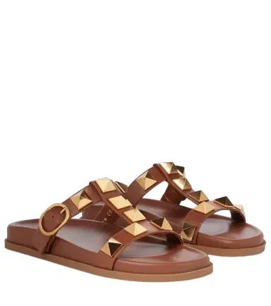 Valentino Garavani Roman Stud leather slides | Thumbnail 1 Valentino Garavani Roman Stud leather slides | Thumbnail 1