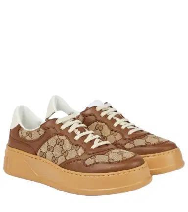 Gucci GG Canvas leather-trimmed sneakers | Thumbnail 1 Gucci GG Canvas leather-trimmed sneakers | Thumbnail 1