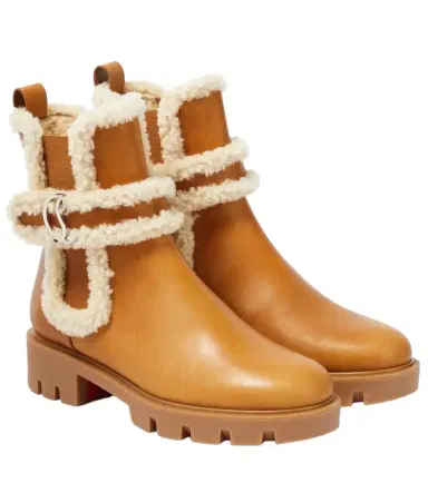 Christian Louboutin CL Chelsea shearling-trimmed ankle boots | Thumbnail 1 Christian Louboutin CL Chelsea shearling-trimmed ankle boots | Thumbnail 1