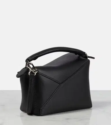 Loewe Puzzle Edge Mini leather top-handle bag | Thumbnail 2 Loewe Puzzle Edge Mini leather top-handle bag | Thumbnail 2