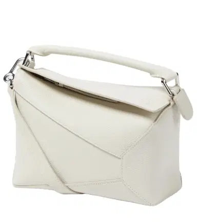 Loewe Puzzle Edge Small leather top-handle bag | Thumbnail 1 Loewe Puzzle Edge Small leather top-handle bag | Thumbnail 1