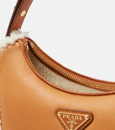 Prada Arqué Small shearling-trimmed shoulder bag | Thumbnail 2 Prada Arqué Small shearling-trimmed shoulder bag | Thumbnail 2