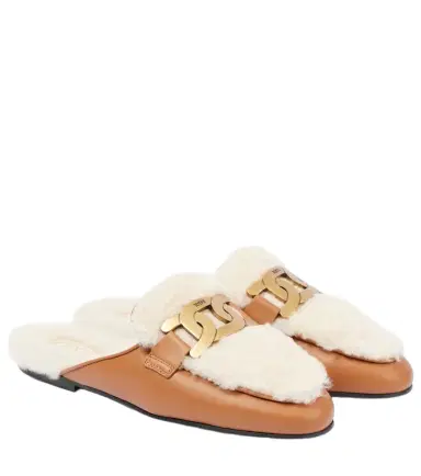 Tod's Catena shearling and leather mules | Thumbnail 1 Tod's Catena shearling and leather mules | Thumbnail 1