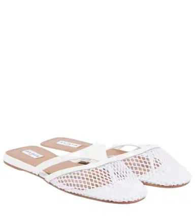 Alaïa Alaïa Infradito leather and fishnet mules | Thumbnail 1 Alaïa Alaïa Infradito leather and fishnet mules | Thumbnail 1
