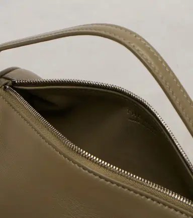 The Row Round 90's leather tote bag | Thumbnail 2 The Row Round 90's leather tote bag | Thumbnail 2