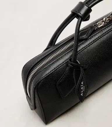 Alaia Alaïa Le Teckel Small leather clutch | Thumbnail 2 Alaia Alaïa Le Teckel Small leather clutch | Thumbnail 2