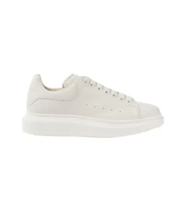 Alexander McQueen Oversized leather sneakers | Thumbnail 1 Alexander McQueen Oversized leather sneakers | Thumbnail 1