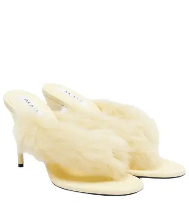 Alaïa Alaïa Shearling and leather thong sandals | Thumbnail 1 Alaïa Alaïa Shearling and leather thong sandals | Thumbnail 1