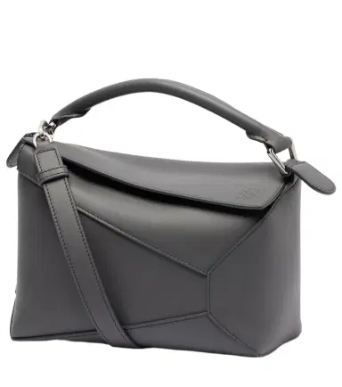 Loewe Puzzle Edge Small leather top-handle bag | Thumbnail 1 Loewe Puzzle Edge Small leather top-handle bag | Thumbnail 1