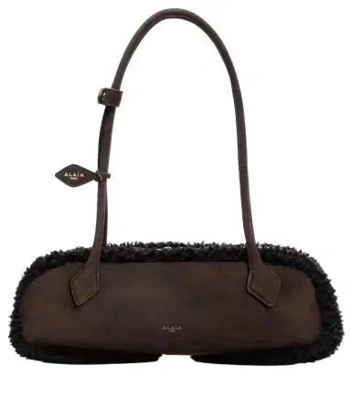 Alaïa Alaïa Le Teckel Medium suede shoulder bag | Thumbnail 1 Alaïa Alaïa Le Teckel Medium suede shoulder bag | Thumbnail 1