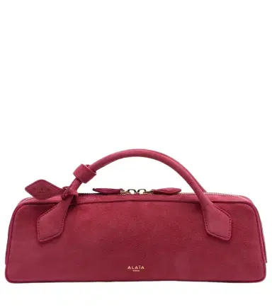 Alaïa Alaïa Le Teckel Small suede clutch | Thumbnail 1 Alaïa Alaïa Le Teckel Small suede clutch | Thumbnail 1
