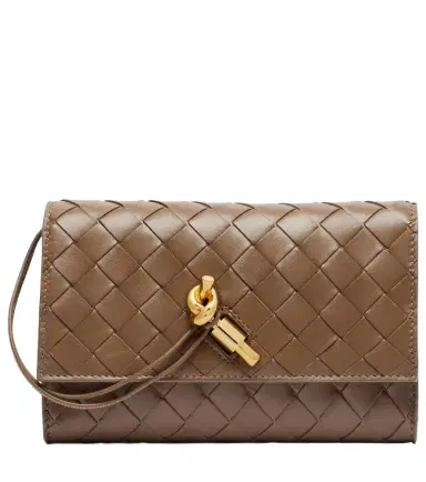 Bottega Veneta Andiamo Intrecciato leather clutch | Thumbnail 1 Bottega Veneta Andiamo Intrecciato leather clutch | Thumbnail 1