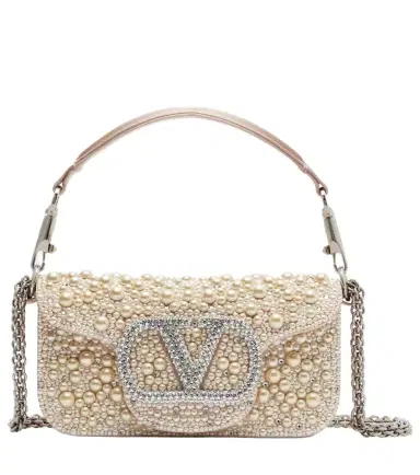 Valentino Garavani Locò Small embellished satin shoulder bag | Thumbnail 1 Valentino Garavani Locò Small embellished satin shoulder bag | Thumbnail 1