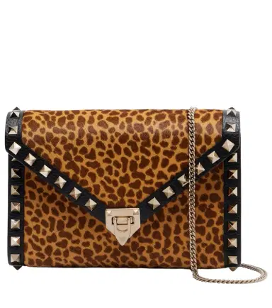 Valentino Garavani Rockstud Mini calf hair crossbody bag | Thumbnail 1 Valentino Garavani Rockstud Mini calf hair crossbody bag | Thumbnail 1