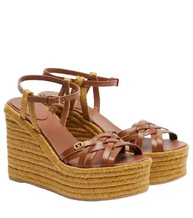 Valentino Garavani Bribri 120 leather-trimmed raffia espadrille wedges | Thumbnail 1 Valentino Garavani Bribri 120 leather-trimmed raffia espadrille wedges | Thumbnail 1