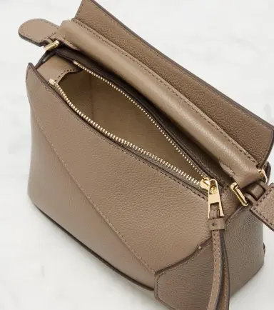 Loewe Puzzle Edge Mini leather top-handle bag | Thumbnail 2 Loewe Puzzle Edge Mini leather top-handle bag | Thumbnail 2