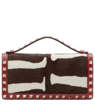 Valentino Garavani Rockstud Mini calf hair crossbody bag | Thumbnail 1 Valentino Garavani Rockstud Mini calf hair crossbody bag | Thumbnail 1