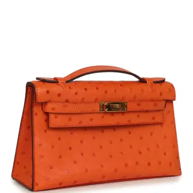 HERMÈS Pre-owned Hermes Kelly Pochette Tangerine Ostrich Gold Hardware | Thumbnail 2 HERMÈS Pre-owned Hermes Kelly Pochette Tangerine Ostrich Gold Hardware | Thumbnail 2