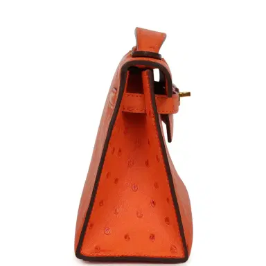 HERMÈS Pre-owned Hermes Kelly Pochette Tangerine Ostrich Gold Hardware | Thumbnail 3 HERMÈS Pre-owned Hermes Kelly Pochette Tangerine Ostrich Gold Hardware | Thumbnail 3